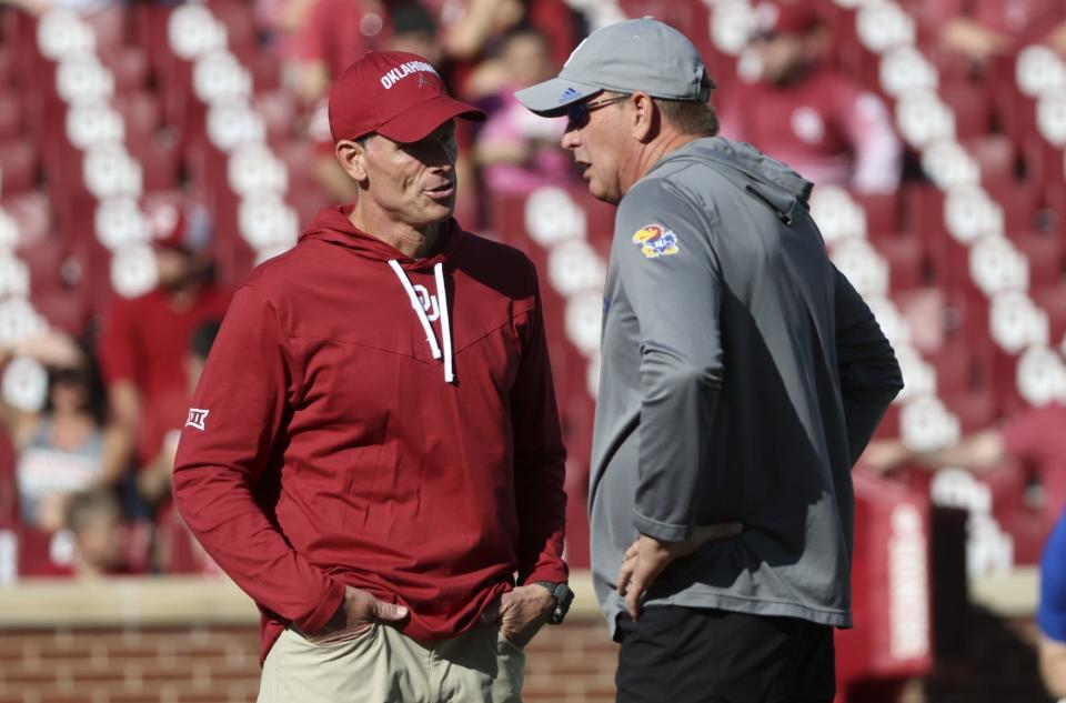 Oklahoma coach Brent Venables, left, and Kansas coach Lance Leipold lead Texas' next two opponents. The Longhorns will host No. 24 Kansas this week and then meet No. 14 Oklahoma next week at the Cotton Bowl.