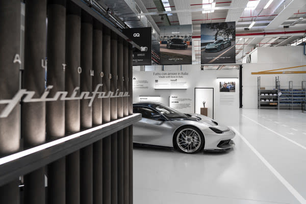 The Battista next to the Bespoke area at the Battista Atelier of Automobili Pininfarina in Cambiano.