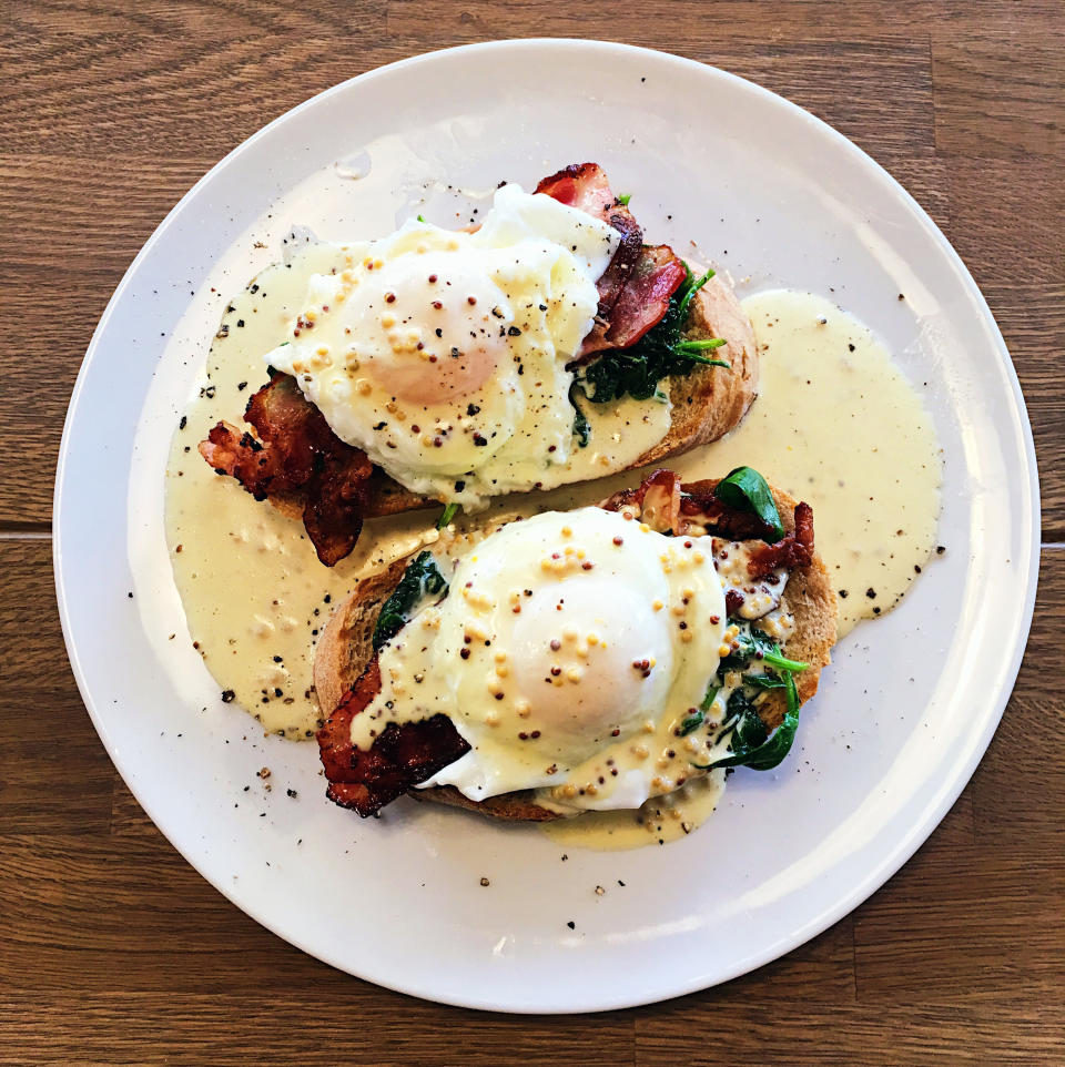 A plate of eggs Benedict.