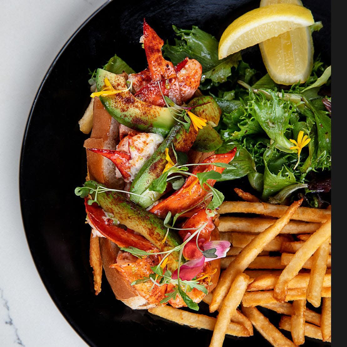 A lobster roll is among the Saturday brunch items at Acqua Cafe.