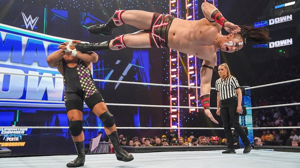 Singapore wrestler Sean Tan, wrestling as Dante Chen, connecting on a drop-kick during the weekly WWE Smackdown programme, his debut on US national television. 