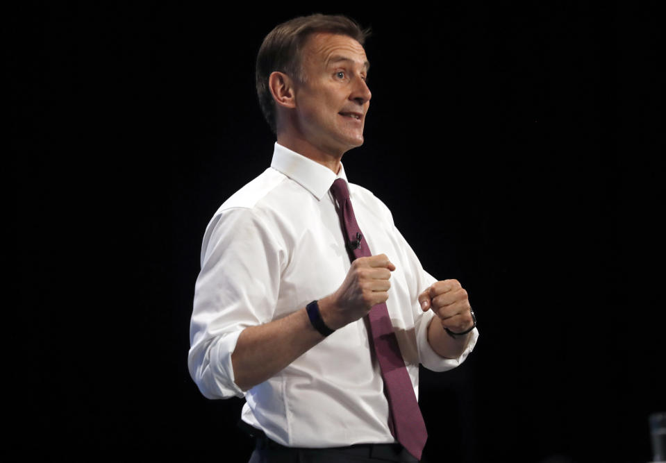 Conservative party leadership candidate Jeremy Hunt delivers his speech during a Conservative leadership hustings at ExCel Centre in London, Wednesday, July 17, 2019. The two contenders, Jeremy Hunt and Boris Johnson are competing for votes from party members, with the winner replacing Prime Minister Theresa May as party leader and Prime Minister of Britain's ruling Conservative Party. (AP Photo/Frank Augstein)