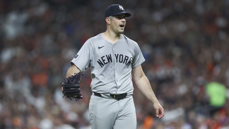 Mar 29, 2024; Houston, Texas, USA; New York Yankees starting pitcher Carlos Rodon (55) reacts after issuing a walk during the second inning against the Houston Astros at Minute Maid Park.