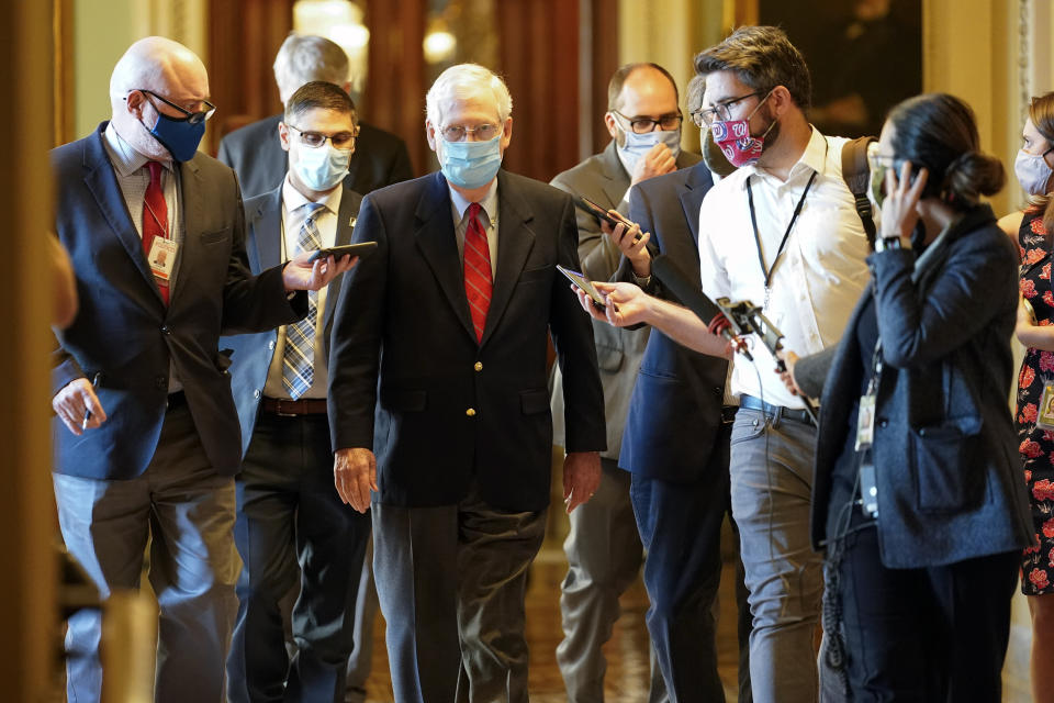 Senate Majority Leader Mitch McConnell of Ky., talks with reporters after he spoke on the Senate floor Monday, Nov. 9, 2020, at the Capitol in Washington. (AP Photo/Susan Walsh)