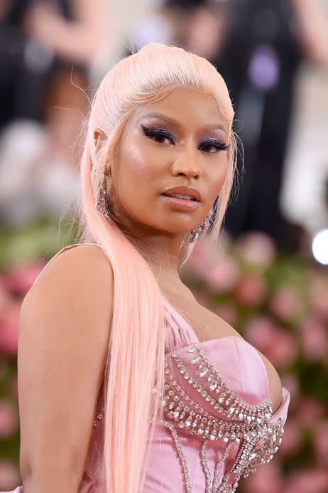 Nicki Minaj in a pink gown with embellished bodice at an event