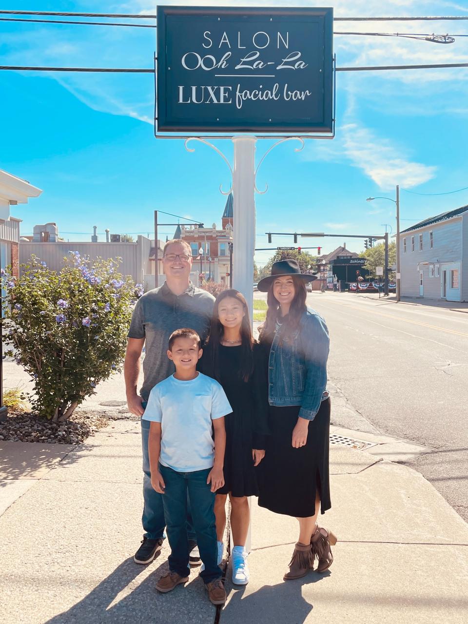 Katie Butler with her husband Trinity and their children KimberLinn and Barrett.