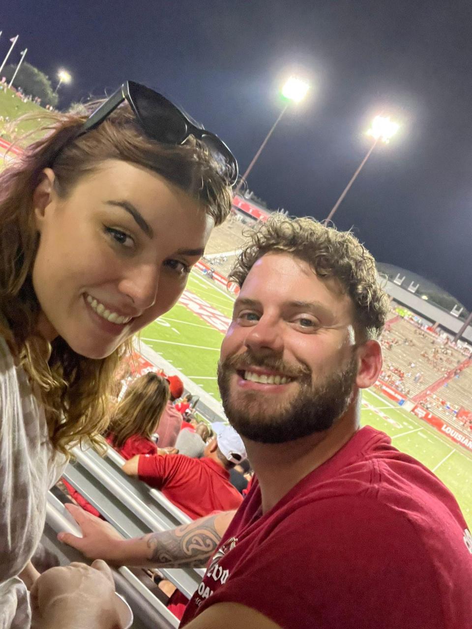 Molly Jones, left and Pete Stanton, from Oxfordshire, England, attend the Louisian Ragin' Cajuns football game against Eastern Michigan Sept. 10 , 2022 at Cajun Field.