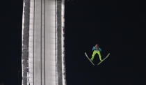 Team Germany's Severin Freund soars through the air during the Team Ski Jumping World Cup in Oberstdorf February 17, 2013. REUTERS/Michaela Rehle (GERMANY - Tags: SPORT SKIING) - RTR3DX9U