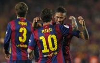 Lionel Messi celebrates with Neymar after scoring the third goal for Barcelona Reuters / Albert Gea