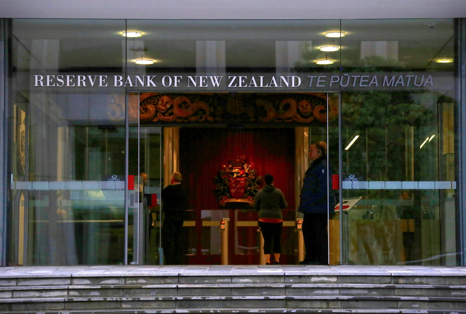 A security guard stands in the main entrance to the Reserve Bank of New Zealand located in central Wellington, New Zealand, July 3, 2017. Picture taken July 3, 2017.   REUTERS/David Gray