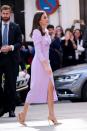 <p> Midi dresses are a favourite of Queen Letizia's, and although she often opts for simple shapes, there is always a unique detail included that elevates the look. We love the front ruched texture, puffy shoulders, and elegant leg slit that make this the perfect formal gown that isn't at all plain. </p>