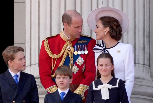 The Prince and Princess of Wales with their children, Prince George, Prince Louis and Princess Charlotte, on the balcony of Buckingham Palace