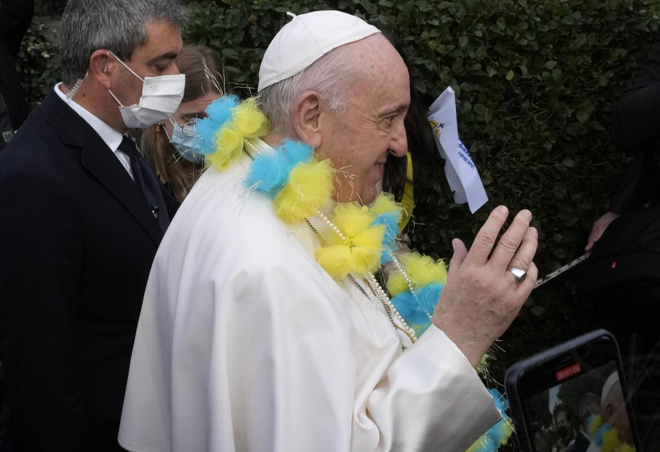 Pope Francis arrives for a meeting with young people at the Saint Dionysius School of the Ursuline Sisters in Athens, Greece, Monday, Dec. 6, 2021. Francis' five-day trip to Cyprus and Greece has been dominated by the migrant issue and Francis' call for European countries to stop building walls, stoking fears and shutting out "those in greater need who knock at our door." (AP Photo/Alessandra Tarantino)