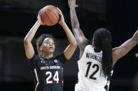South Carolina guard LeLe Grissett (24) looks for help as she is defended by Vanderbilt's Demi Washington (12) in the first half of an NCAA college basketball game Sunday, Jan. 12, 2020, in Nashville, Tenn. (AP Photo/Mark Humphrey)