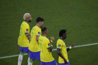 Brazil's Neymar, left, celebrates after scoring his side's second goal from the penalty spot during the World Cup round of 16 soccer match between Brazil and South Korea, at the Stadium 974 in Doha, Qatar, Monday, Dec. 5, 2022. (AP Photo/Darko Bandic)