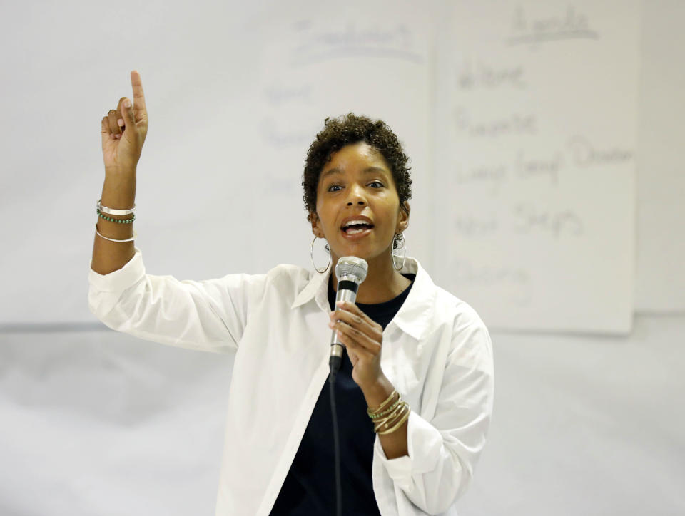 In this Aug. 24, 2018 photo, Rukia Lumumba of the People's Advocacy Institute and Malcolm X Grassroots Movement, leads a discussion at the Black Women Matter Issues Forum of small political rural and urban organizations and the Black Voters Matter field team in a leadership exercise in Jackson, Miss. The meeting was in part to introduce national media to these hands-on organizations that work throughout the state and also to build interest and excitement among the groups, that are mainly women led, for the upcoming election, defining issues and the campaigning in locales where black turnout might be key. (AP Photo/Rogelio V. Solis)