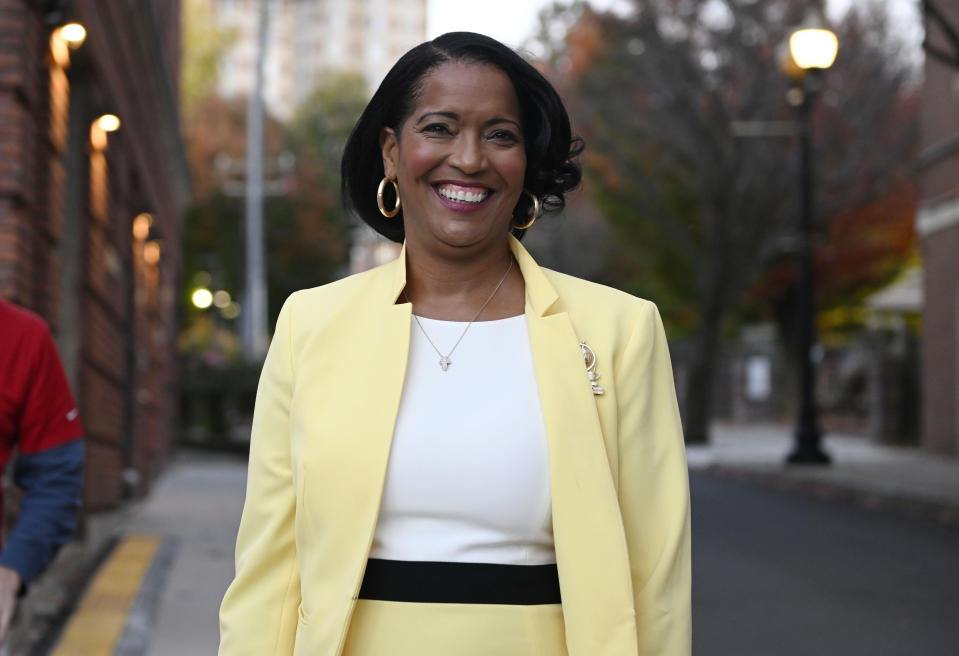 U.S. Rep. Jahana Hayes, D-Conn., arrives for a debate against Republican House candidate George Logan, Tuesday, Oct. 18, 2022, in Waterbury, Conn. Hayes is running for re-election in Connecticut's fifth congressional district. (AP Photo/Jessica Hill)