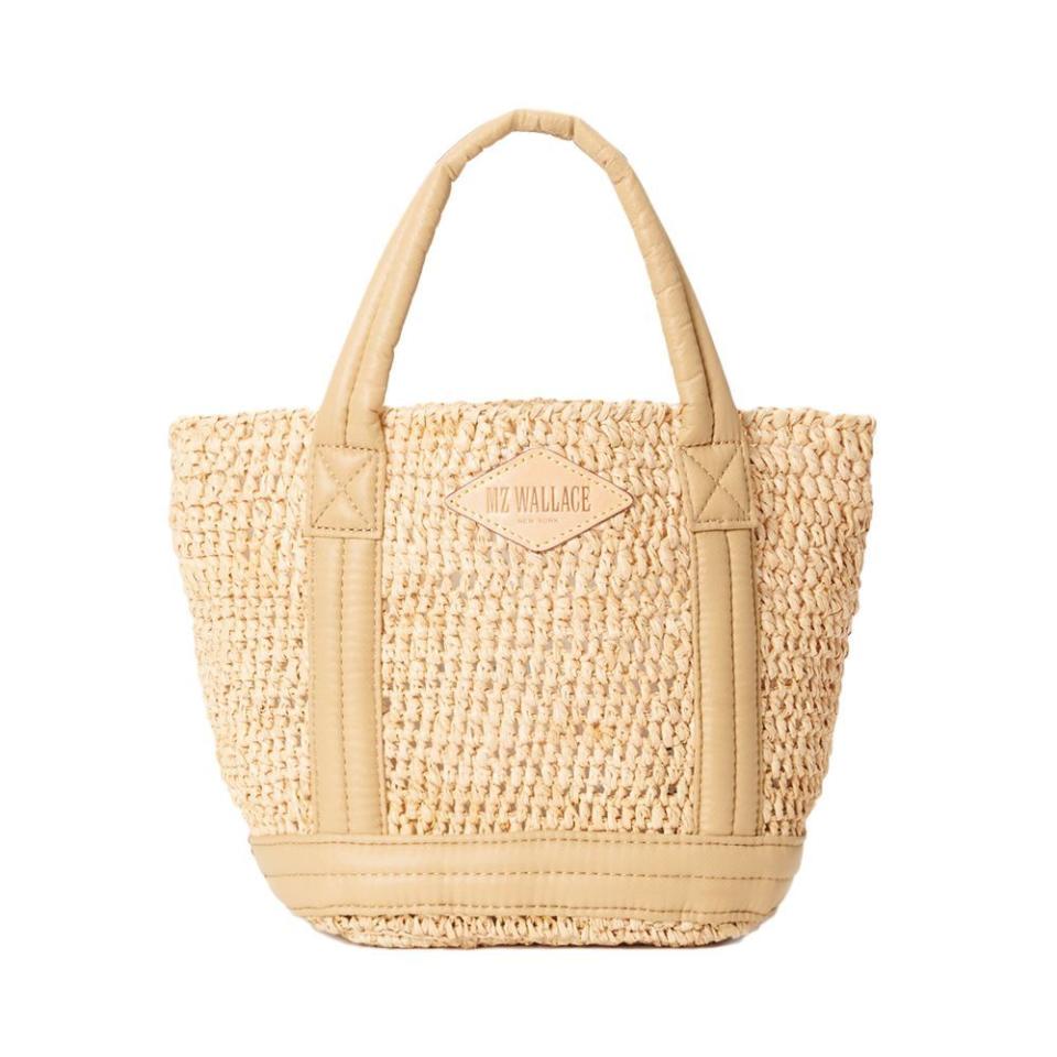 <p><a href="https://go.redirectingat.com?id=74968X1596630&url=https%3A%2F%2Fwww.mzwallace.com%2Fproducts%2Fraffia-camel-small-raffia-tote&sref=https%3A%2F%2F" rel="nofollow noopener" target="_blank" data-ylk="slk:Shop Now;elm:context_link;itc:0;sec:content-canvas" class="link ">Shop Now</a></p><p>Small Raffia Tote</p><p>mzwallace.com</p><p>$255.00</p>