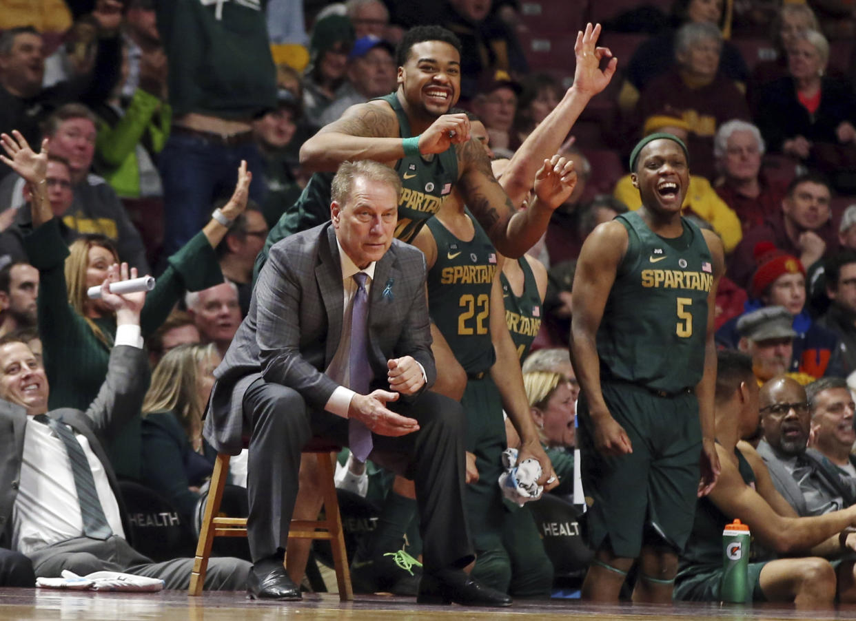 Michigan State has come under fire for its handling of allegations of violence toward women by football and basketball players (AP Photo/Jim Mone)