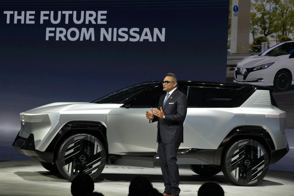 Nissan Executive Ashwani Gupta presents a concept car, Arizon during the Auto Shanghai 2023 show in Shanghai, Tuesday, April 18, 2023. Global and Chinese automakers plan to unveil more than a dozen new electric SUVs, sedans and muscle cars this week at the Shanghai auto show, their first full-scale sales event in four years in a market that has become a workshop for developing electrics, self-driving cars and other technology. (AP Photo/Ng Han Guan)