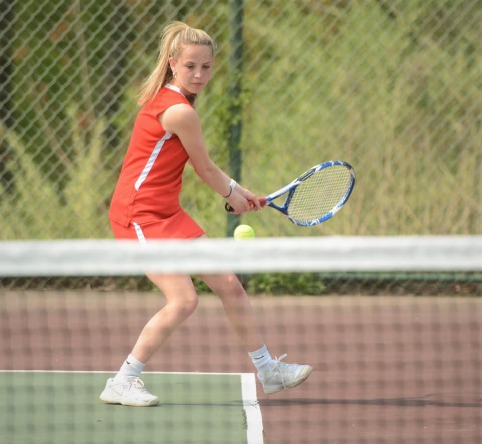 NFA junior Katie Lavoie gets ready to return the ball duing the Wildcats' Senior Day match last spring.