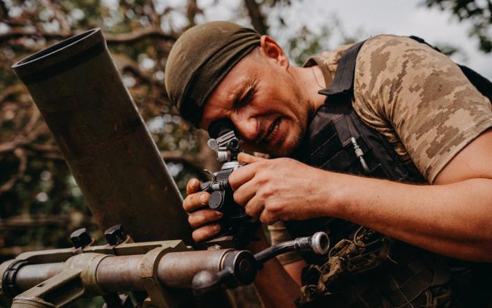 Ukrainian soldiers from the 35th Brigade fire targets using 120 mm mortar near one of newly captured villages in Makarivka