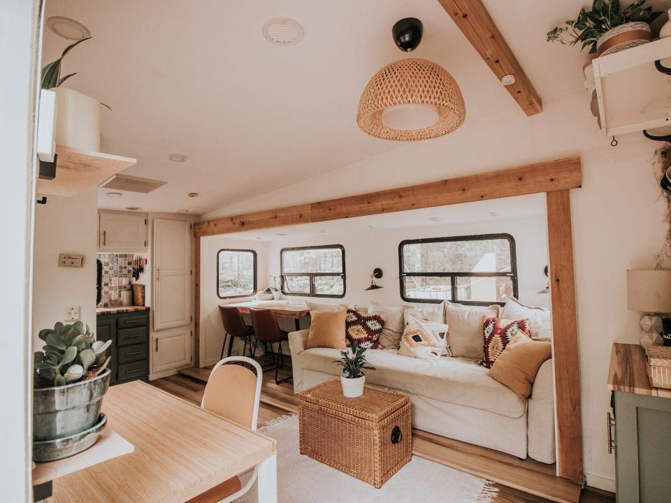 The living room and table inside Tyler and Todd Gibbon-Thorne's RV