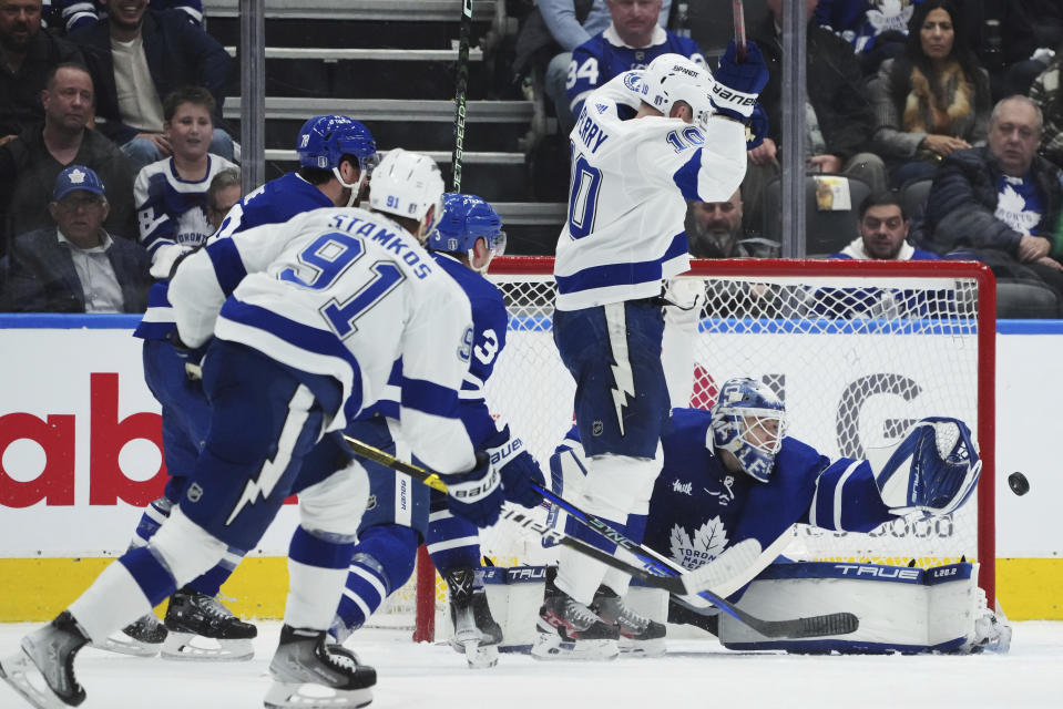 Toronto Maple Leafs goaltender Ilya Samsonov (35) makes a save on Tampa Bay Lightning forward Steven Stamkos (91) during the second period of Game 1 of a first-round NHL hockey playoff series Tuesday, April 18, 2023, in Toronto. (Nathan Denette/The Canadian Press via AP)