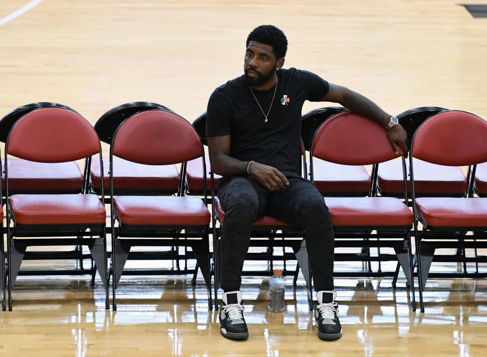 Kyrie Irving, while at the USA men’s national team practice in Las Vegas on Thursday, went into detail about recovering from his knee injury over the past several months, describing it as a “long [expletive] few months.” (Getty Images)
