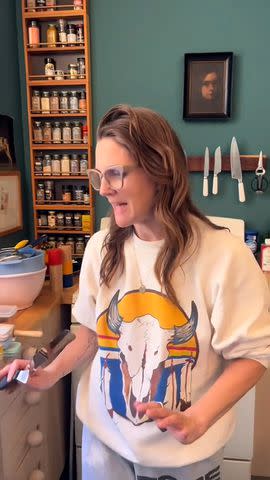 <p>Drew Barrymore/TikTok</p> Drew Barrymore in her kitchen