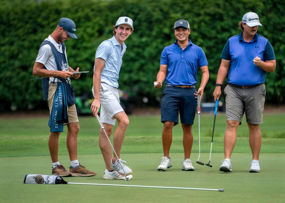 Caddy Austin Litchke, left, Rafe Cochran, David Liu and Carson Klawonn laugh on the tee Friday during the sixth annual Rafe Cochran Golf Classic at Trump International Golf Club in suburban West Palm Beach.