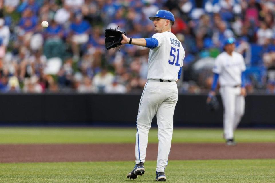 Kentucky starter Trey Pooser gets the ball back from a teammate after an out during the fourth inning against Oregon State on Saturday at Kentucky Proud Park.