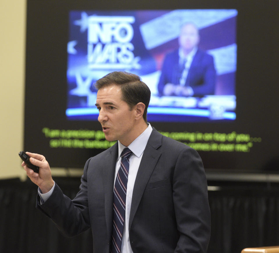 Attorney Chris Mattei displays a video during his closing statements in the Alex Jones Sandy Hook defamation damages trial in Superior Court in Waterbury, Conn., on Thursday, Oct. 2022. (H John Voorhees III/Hearst Connecticut Media via AP, Pool)