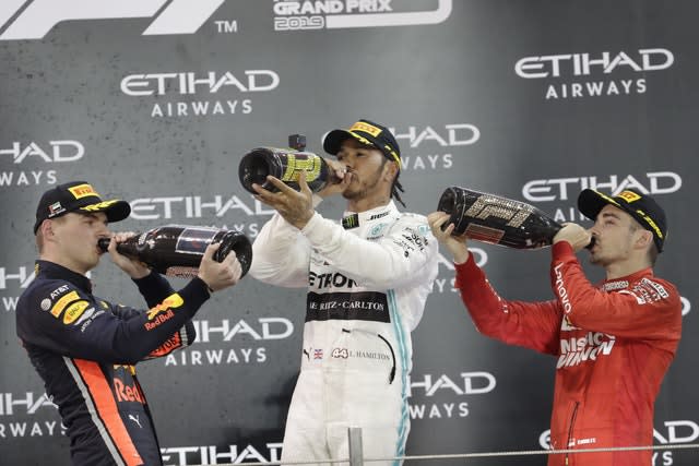 Mercedes driver Lewis Hamilton, centre, won his 11th race of the season