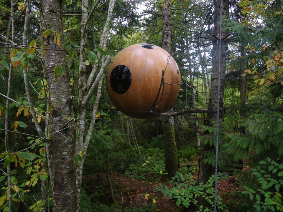 A Free Spirit Spheres treehouse is shown in Qualicum Beach on Vancouver Island in a handout photo. Climbing trees and building tree forts are common activities for kids, and often as kids grow up they give up their love for playing in the trees. Tom Chudleigh, on the other hand, has been building tree houses for 20 years.