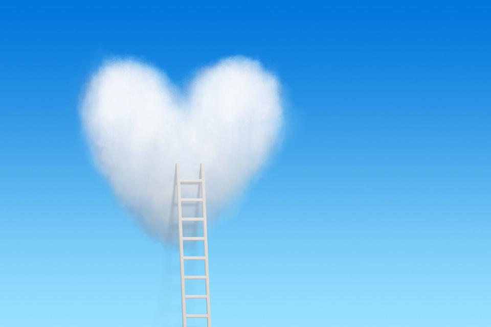 Ladder to heart shaped cloud