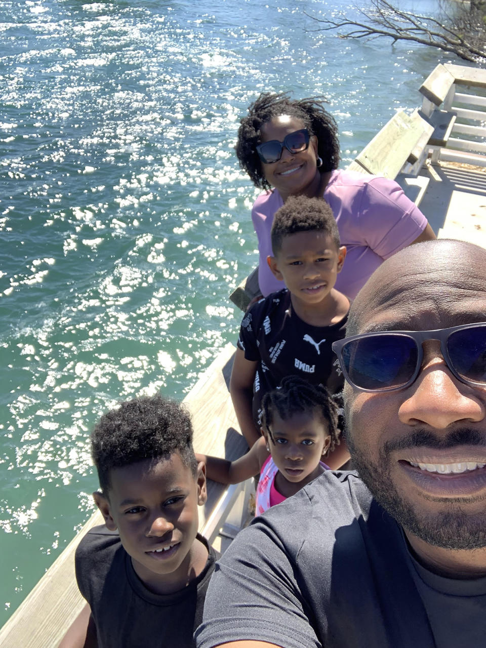 Jabari poses for a selfie with his family, including Nicole, Jalani, Nyah and Josiah. (Families for Safe Schools) 