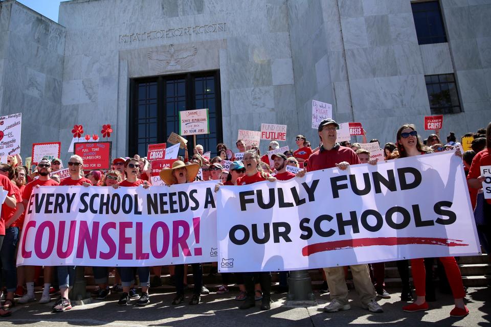 Thousands of teachers and education activists rally for school funding after they marched from Riverfront Park to the Oregon State Capitol in Salem on May 8, 2019.