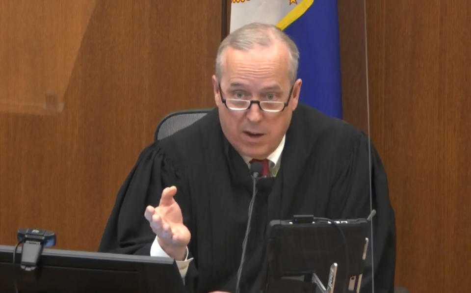 In this image from video, Hennepin County Judge Peter Cahill discusses motions before the court Thursday, April 15, 2021, in the trial of former Minneapolis police officer Derek Chauvin, at the Hennepin County Courthouse in Minneapolis. Chauvin is charged in the May 25, 2020, death of George Floyd. (Court TV via AP, Pool)