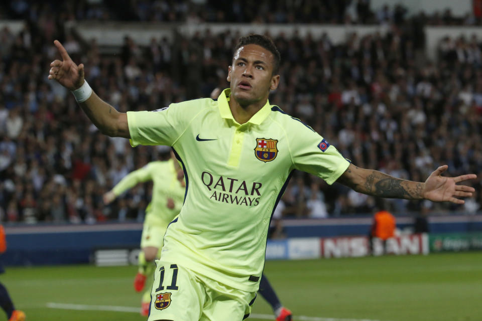 Barcelona&#39;s Neymar celebrates after scoring the opening goal during the quarterfinal first leg Champions League soccer match between Paris Saint Germain and Barcelona at the Parc des Princes stadium in Paris, France, Wednesday, April 15, 2015. (AP Photo/Michel Euler)