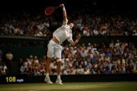 Tennis - Wimbledon - All England Lawn Tennis and Croquet Club, London, Britain - July 13, 2018 John Isner of the U.S. serves during his semi final match against South Africa's Kevin Anderson REUTERS/Tony O'Brien