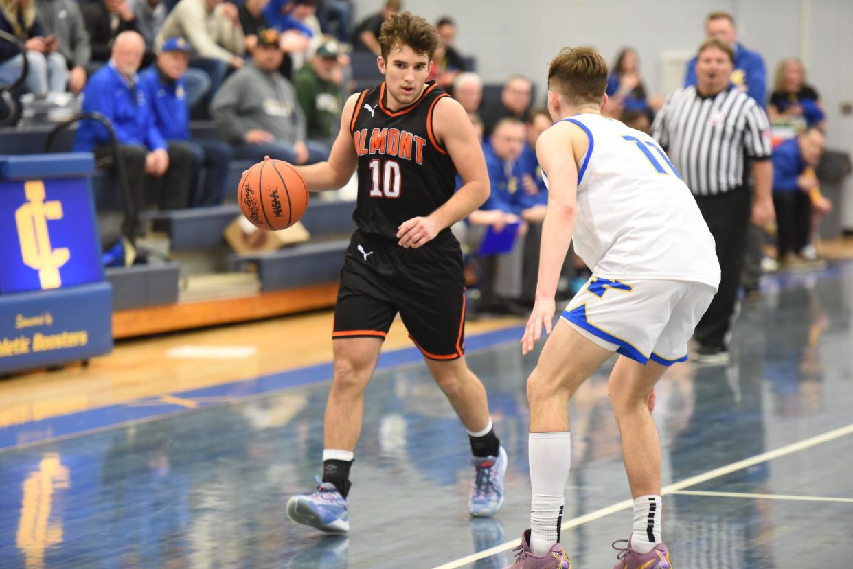 Almont's Marko Radisavljevic dribbles the ball during a game earlier this season.