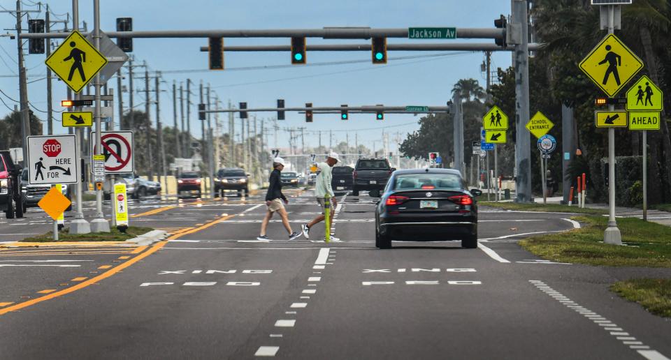 The Florida Dept. of Transportation has started installing crosswalks with blinking caution lights for pedestrians to cross busy streets. In Satellite Beach, there are numerous blinking light crosswalks for people to cross A1A.