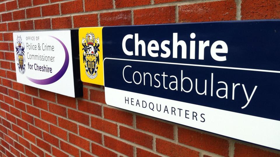A sign saying Cheshire Constabulary headquarters and Office of the Police and Crime Commissioner for Cheshire