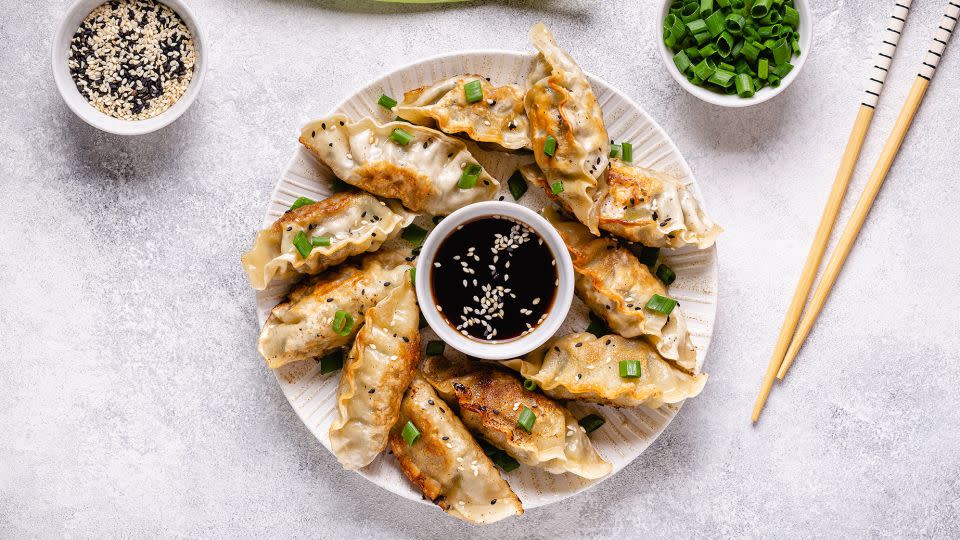 Gyoza are a kin to Chinese pot stickers. - tbralnina/iStockphoto/Getty Images