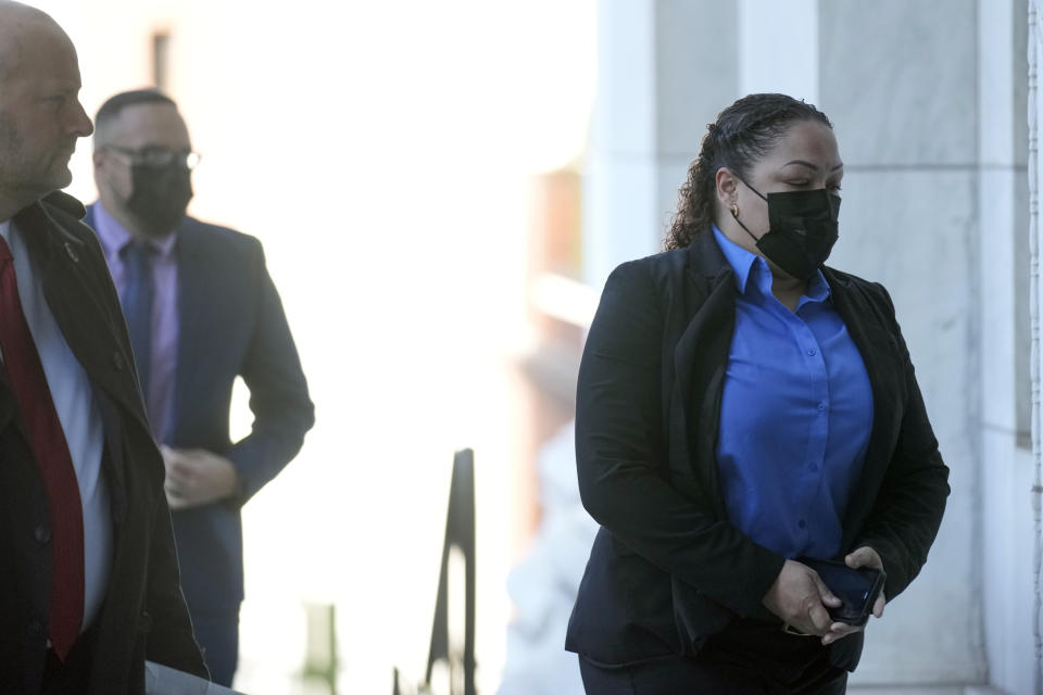 Betsy Segui enters the courthouse in New Haven, Conn., Thursday, Dec. 8, 2022. Five Connecticut police officers, Segui among them, have been charged with misdemeanors Monday over their treatment of a Black man after he was paralyzed from the chest down in the back of a police van. (AP Photo/Seth Wenig)