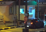 In this handout photo taken from a footage released by State Border Committee of the Republic of Belarus, the car in which Maria Kolesnikova, a member of the Coordination Council created by the opposition, is supposedly sitting parked to check documents at the Belarus-Ukraine border on the Belarus side, Belarus, Tuesday, Sept. 8, 2020. A leading opposition activist in Belarus has been held on the border after she resisted the authorities' attempt to force her to leave the country as part of a clampdown on protests against the re-election of the country's authoritarian leader. (State Border Committee of the Republic of Belarus via AP)