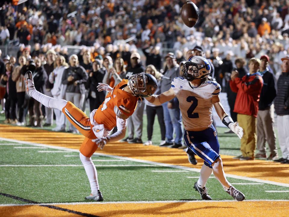 Skyridge’s Mark Baird watches a pass intended for Pleasant Grove’s Shawn Cottle during overtime of a 6A quarterfinal football game at Skyridge High School in Lehi on Friday, Nov. 3, 2023. Skyridge won 37-30 in overtime. | Kristin Murphy, Deseret News