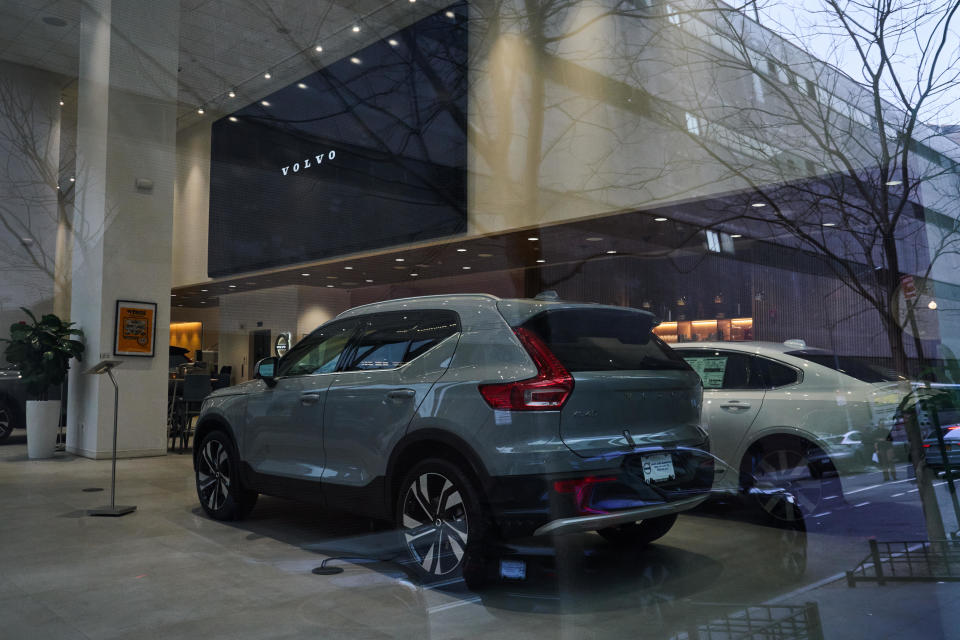 A 2024 Volvo XC40 SUV (left) and a 2024 S90 Recharge plug-in hybrid electric vehicle (right) at a dealership in New York, New York, on Jan. 30, 2024.  / Credit: Bing Guan of Bloomberg via Getty Images