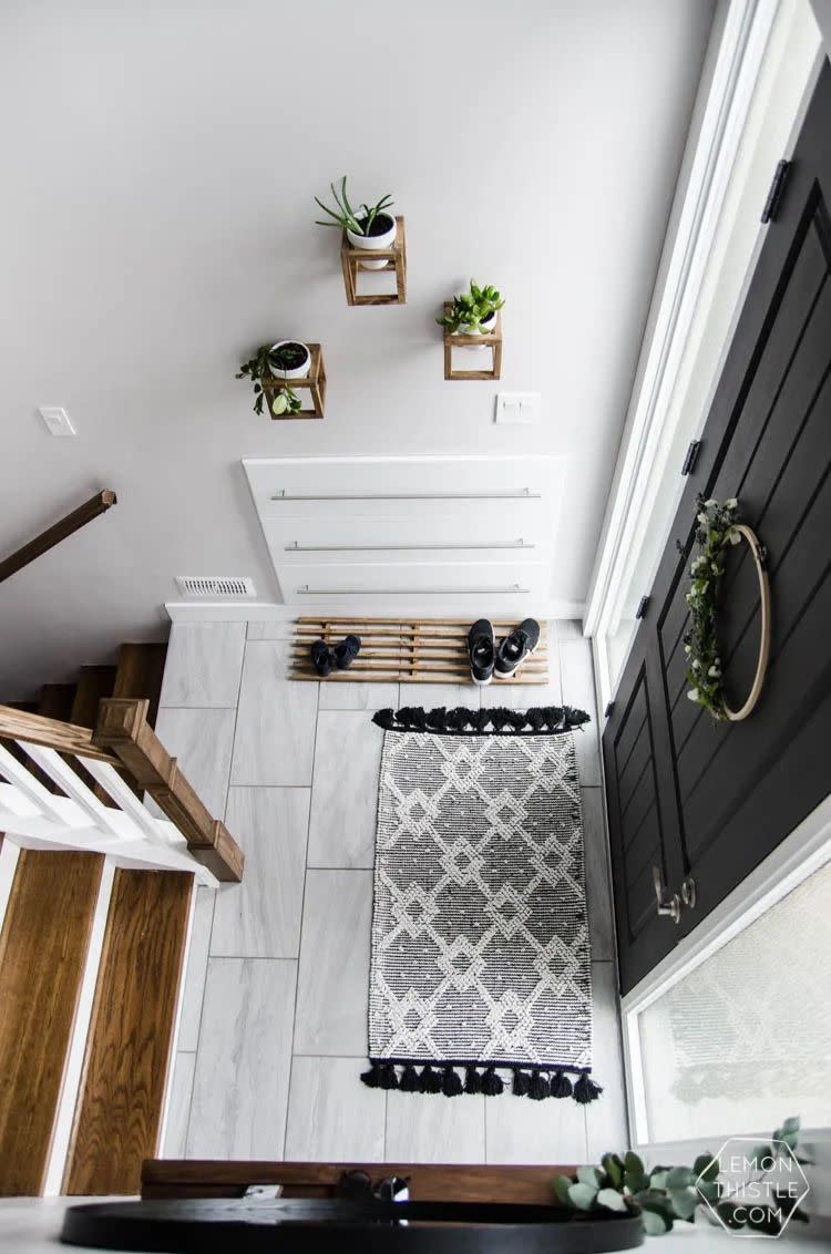 diy shoe storage shelves under stairs in entryway